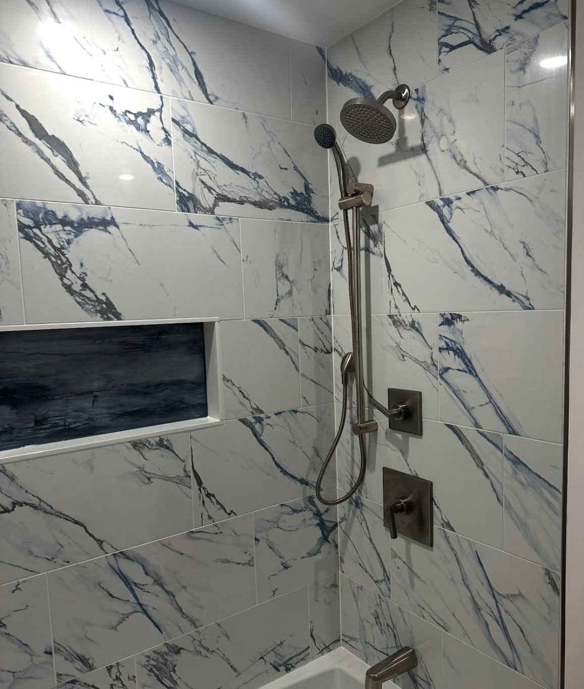 Custom marble tile shower remodel in Gardner, MA