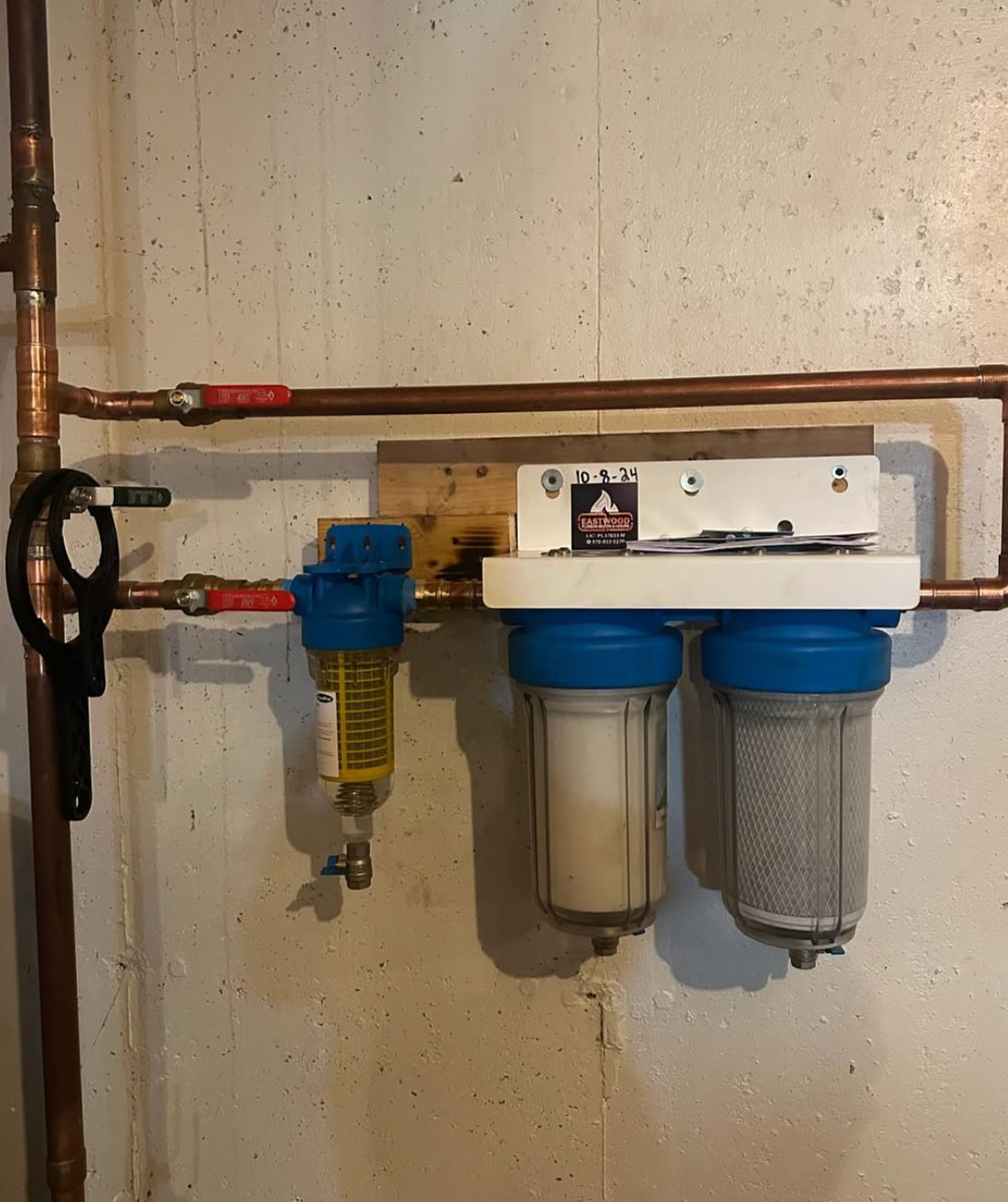 Multi-stage water filtration system installation